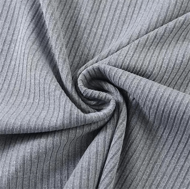 Close-up of gray striped fabric, showing the texture of quick-dry material used in a men's long-sleeve gym t-shirt.